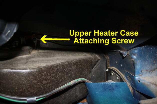 Location of upper heater case attaching screw.
