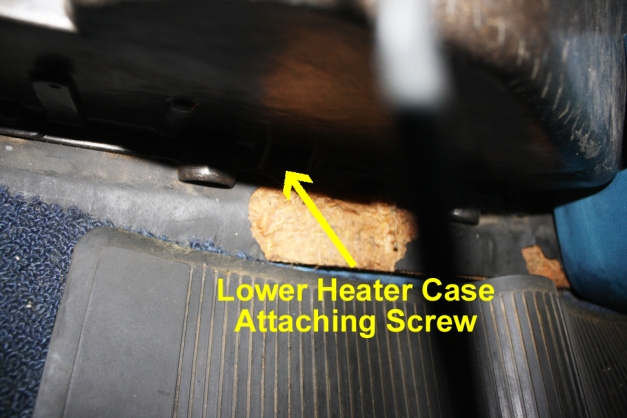 Location of lower heater case attaching screw.